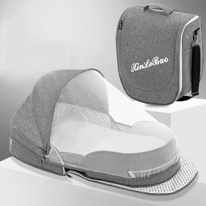 Faltbare Baby Reisewiege mit Moskitonetz und Tragefunktion