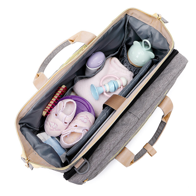 3-in-1 Wickeltasche mit tragbarem Babybett