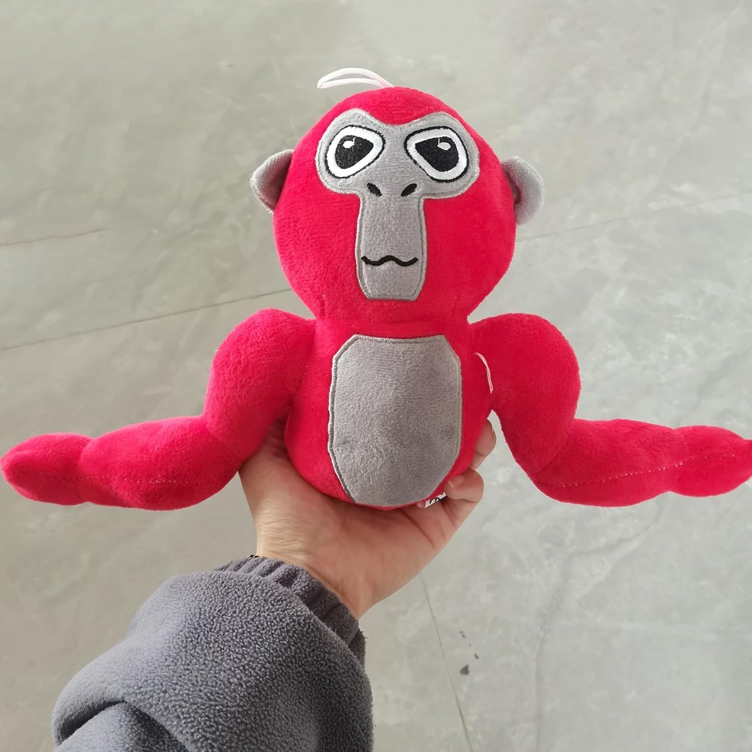 Bunte Affen-Plüschfigur