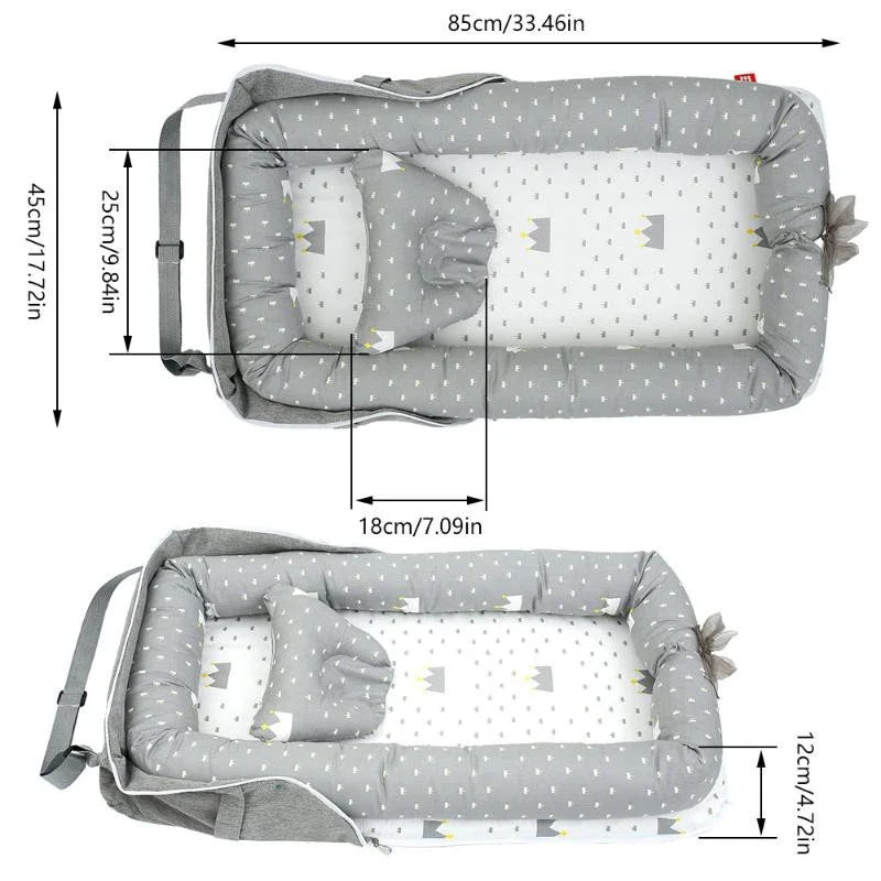 Portable und faltbare Babybett mit Kissen