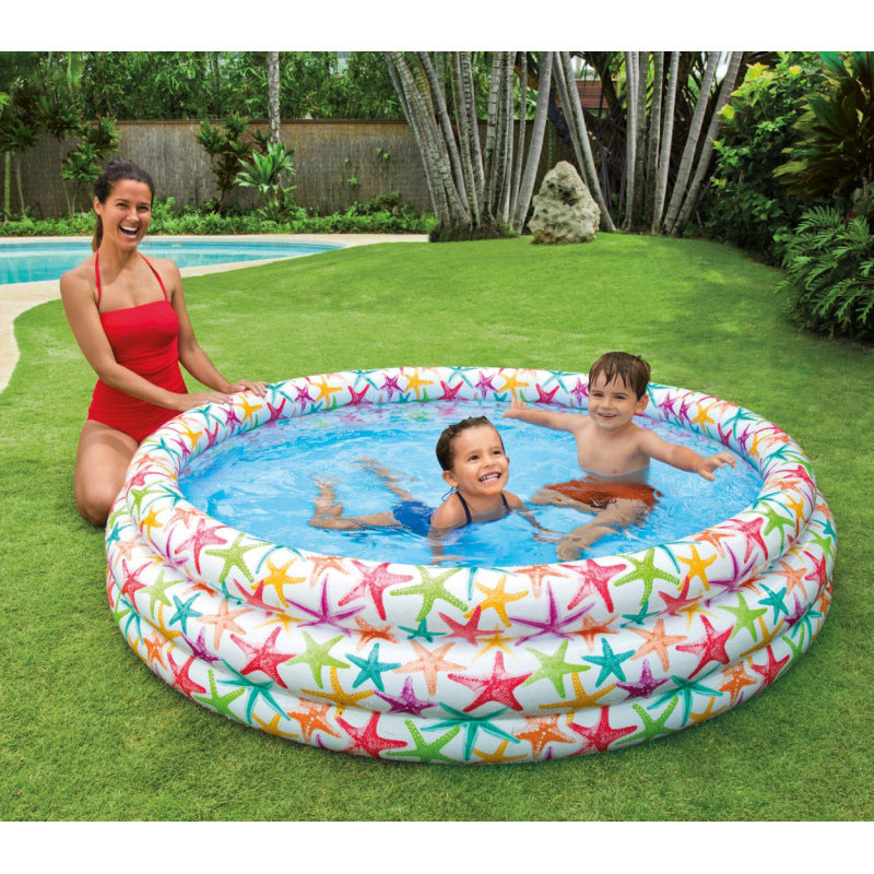Aufblasbares Kinderpool mit buntem Seestern-Design
