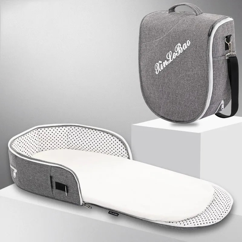 Faltbare Baby Reisewiege mit Moskitonetz und Tragefunktion