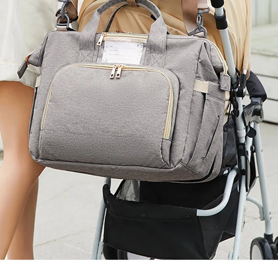 3-in-1 Wickeltasche mit tragbarem Babybett