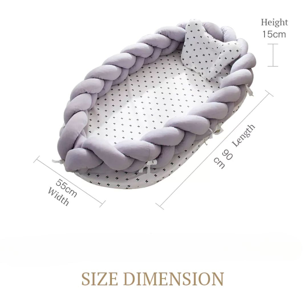 Babybett mit geflochtenem Rand - weiches Kuschelnest für Neugeborene